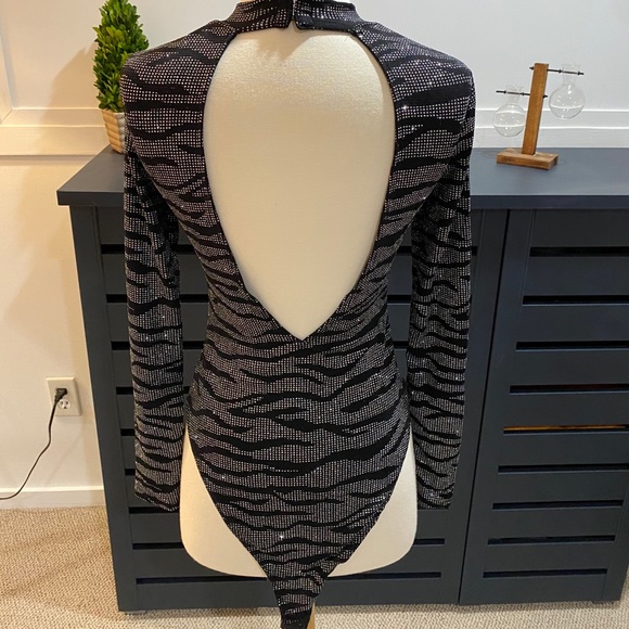 H&M Tops - Zebra Jersey holiday bodysuit NWOT black/ silver
